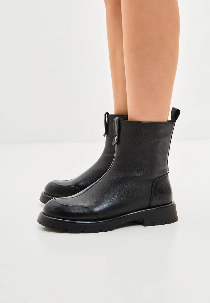 A stylish pair of black Chunky Ankle Boots named Wool Penelope, perfect for women's footwear in winter fashion.