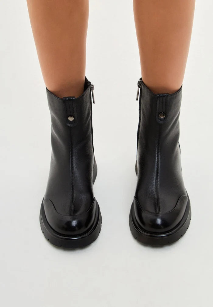 A stylish pair of black Chunky Ankle Boots named Wool Penelope, perfect for women's winter fashion.