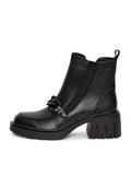 A pair of trendy black ankle boots with chunky heels and fashionable chain details.