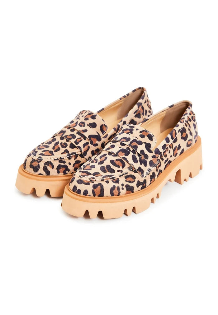 A pair of chunky platform loafers with a trendy leopard print, perfect for women looking for statement footwear.