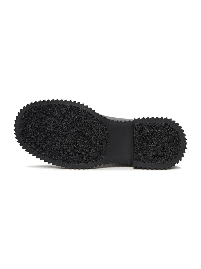 A stylish pair of black Ciara chunky sole ankle boots, perfect for a fashionable statement look.