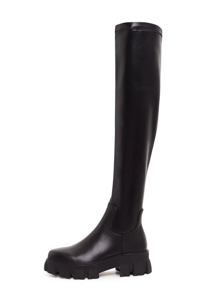 A pair of stylish black knee-high chunky sole Karlie fashion boots - the perfect statement footwear.
