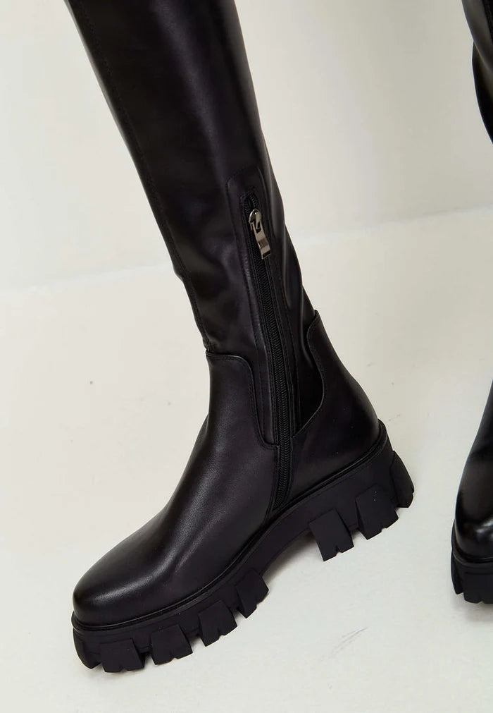 A stylish pair of black Karlie fashion knee high boots with chunky soles - perfect for fashionable and trendy footwear.