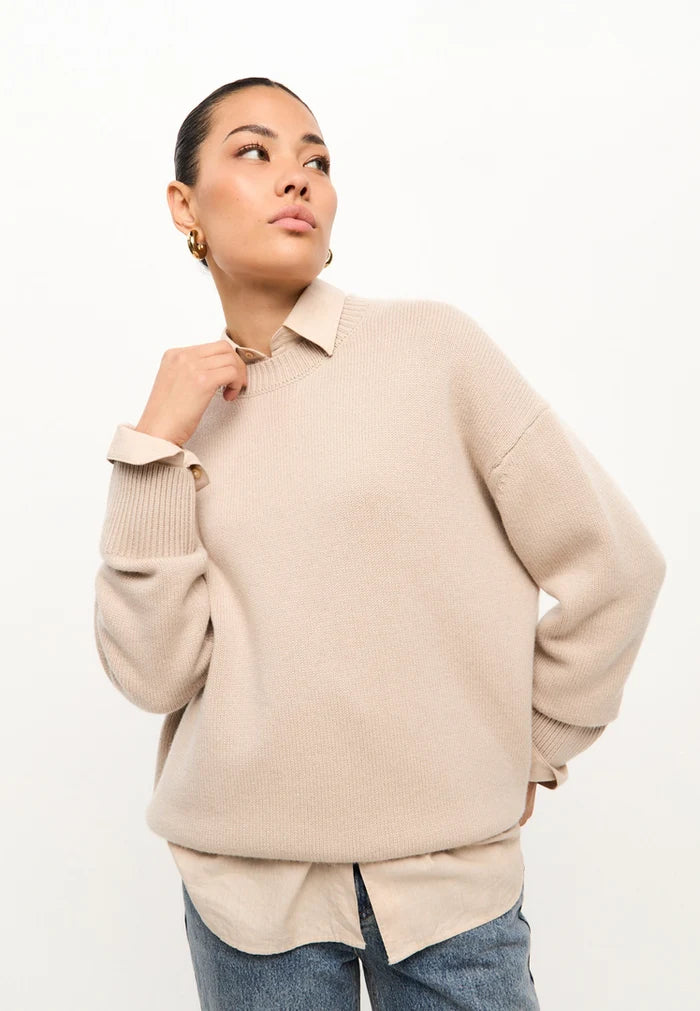 A stylish beige knit pullover, classic crew neck sweater inspired by Mulan, perfect for women's casual wear.