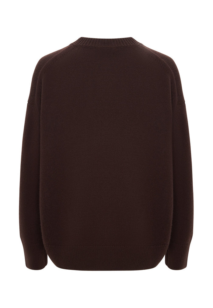 A stylish Mulan brown classic crew neck sweater for women, perfect for winter fashion and casual knitwear looks.