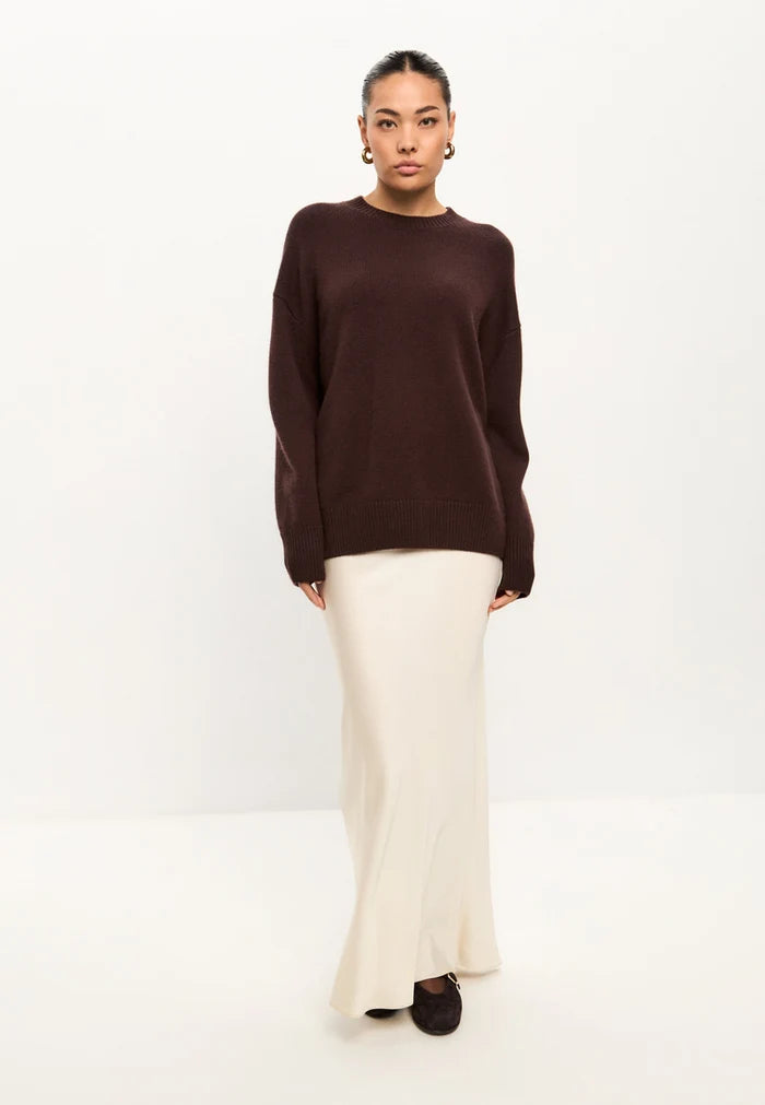 Stay cozy and stylish this winter with a women's Mulan brown classic crew neck sweater, perfect for casual knitwear and on-trend winter fashion.