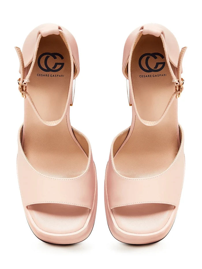 A stylish pair of classic beige open toe heels, perfect beige high heel sandals for women fashionistas.