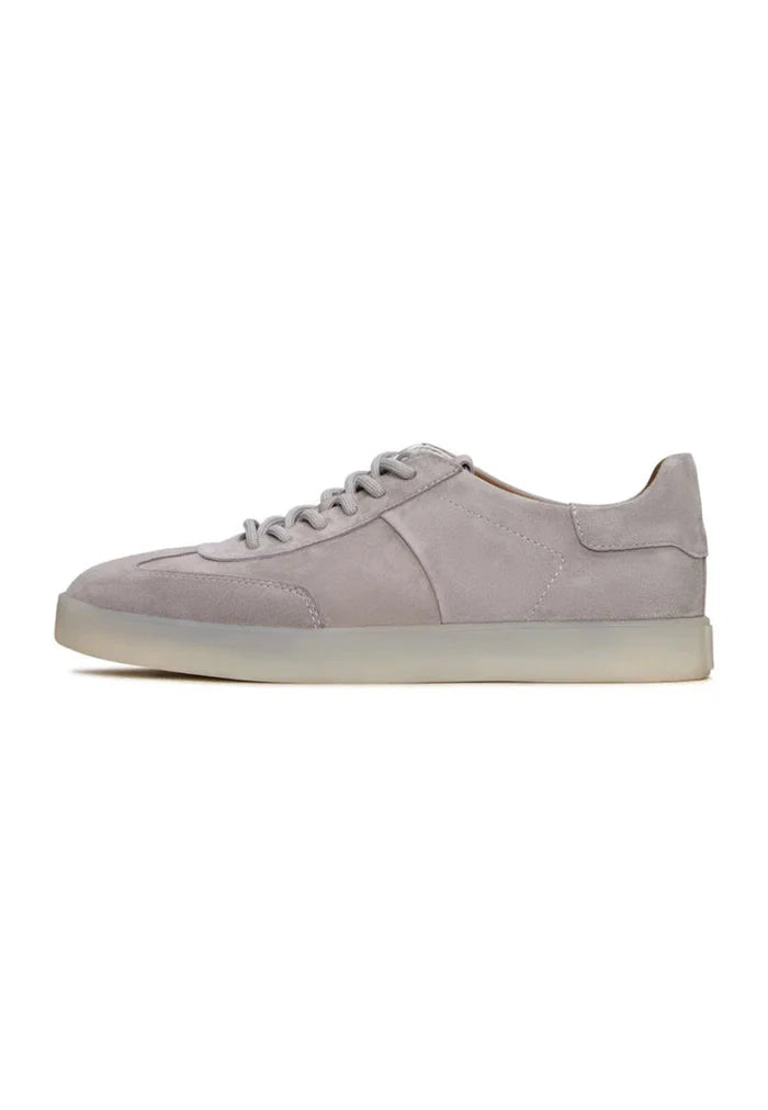 A pair of stylish gray suede low-top sneakers, a classic choice for fashionable footwear.