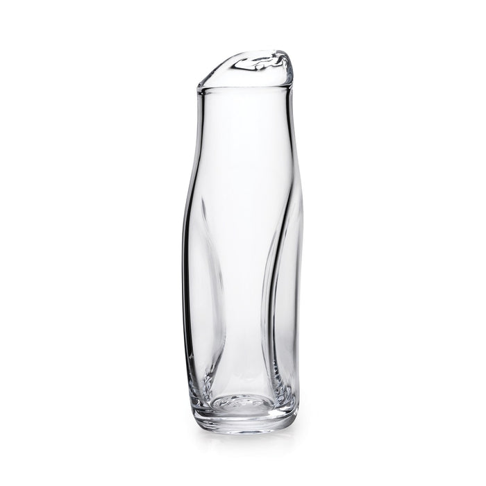 Clear glass carafe with curved sides and a pouring spout at the top.