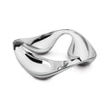 White and silver polished metal serving bowl with three curved compartments and handles.