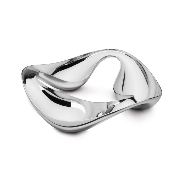 White and silver polished metal serving bowl with three curved compartments and handles.