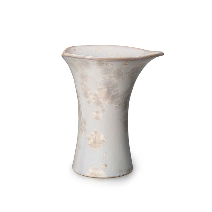 Clear crystalline vase with flared opening and calla lily flower motifs etched throughout the surface.