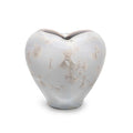Large white heart-shaped vase with frosted surface featuring embossed jellyfish pattern throughout.