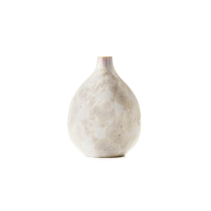 White teardrop-shaped ceramic vase with textured surface and narrow neck opening.