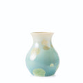 Small ceramic vase with bulbous body tapering to flared rim, featuring cream and pale green crystalline glaze with organic mo
