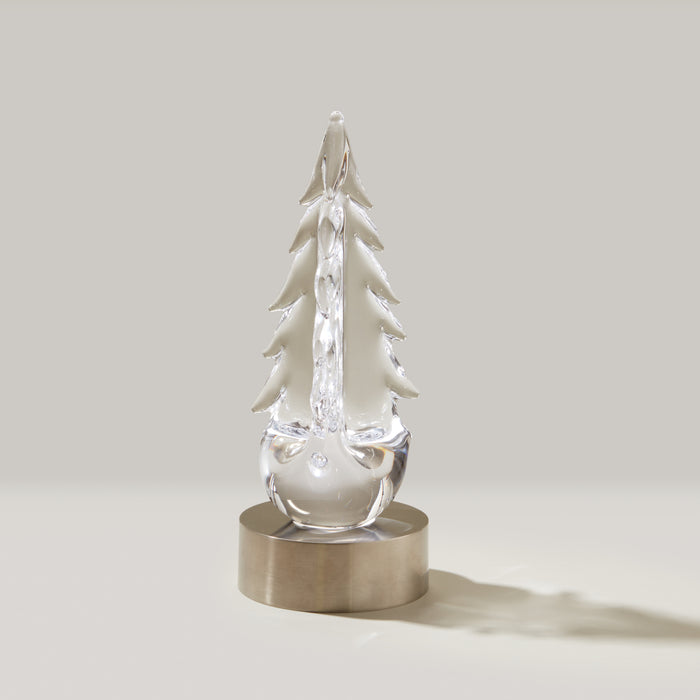 Clear glass tree-shaped figurine with frosted branches on a brushed metal circular base.