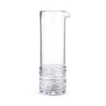 Clear glass cocktail carafe with spout and textured bands around lower portion.