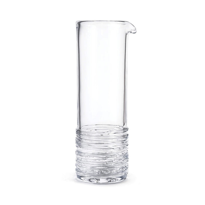 Clear glass cocktail carafe with spout and textured bands around lower portion.