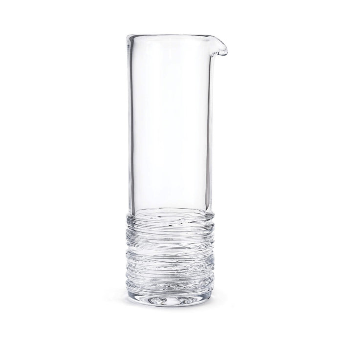 Clear glass cocktail carafe with pouring spout and textured band detail at base.