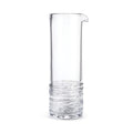 Clear glass cocktail carafe with pouring spout and textured band detail at base.