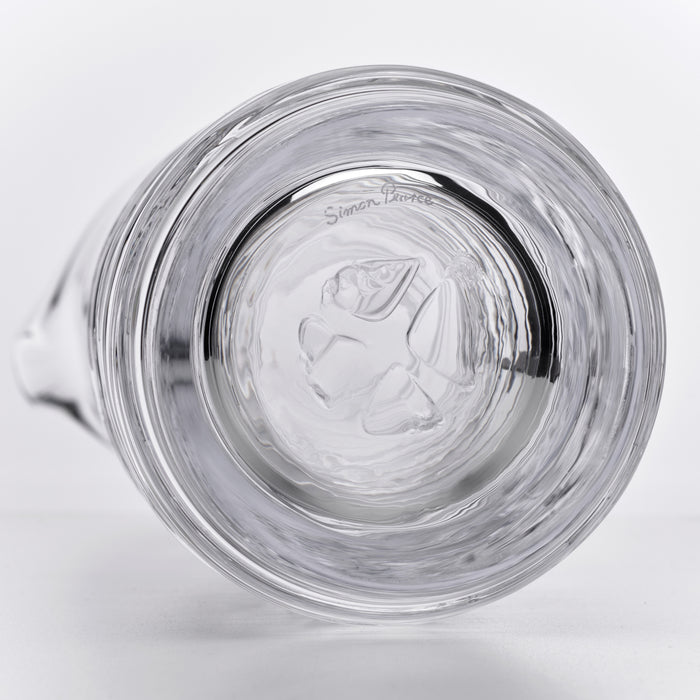 Clear glass carafe with etched fish design and maker's mark visible on interior bottom.