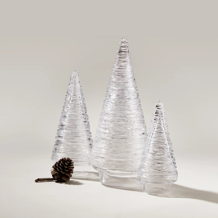 Set of three clear glass cone-shaped decorative trees with textured surfaces and a pinecone accent.