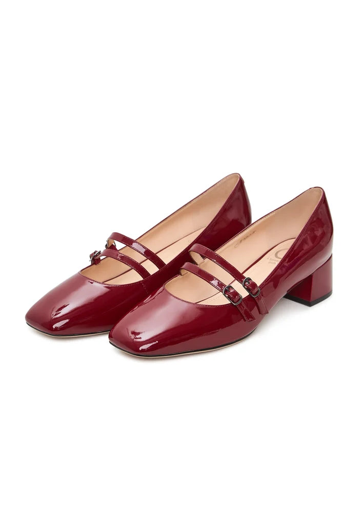A pair of elegant red Mary Jane heels, perfect for women's classy and sophisticated style.