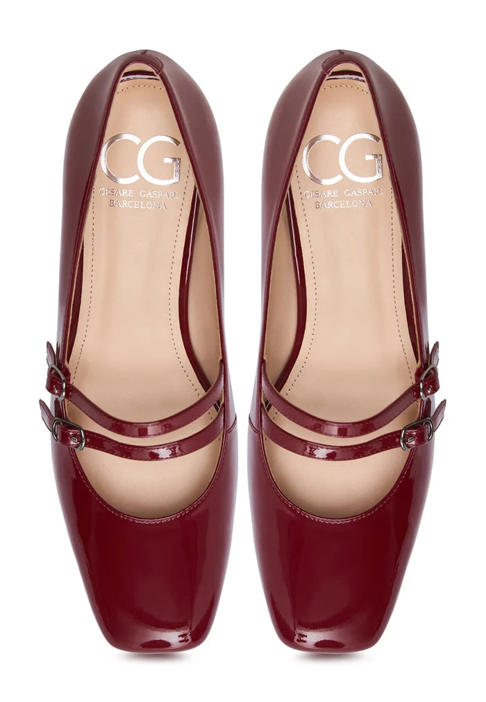 A stylish pair of red Mary Jane heels for women, perfect for adding a touch of elegance to any outfit.