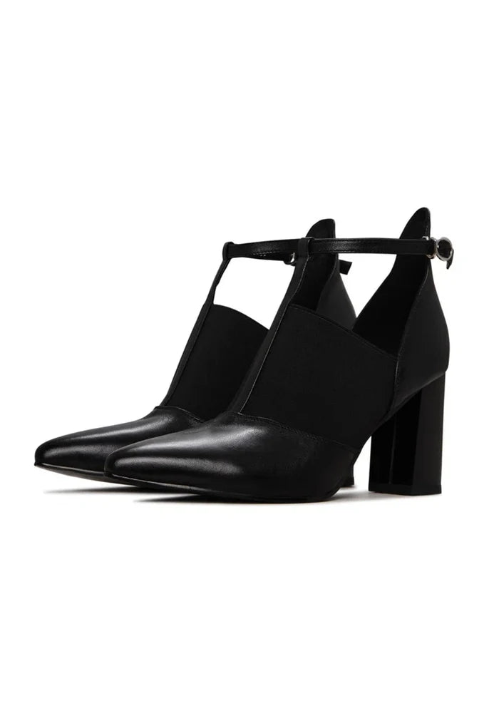 A stylish pair of women's block heel T-Strap sandals, perfect for any outfit with their elevated and chunky heel design - a must-have for those who love fashionable high heels.