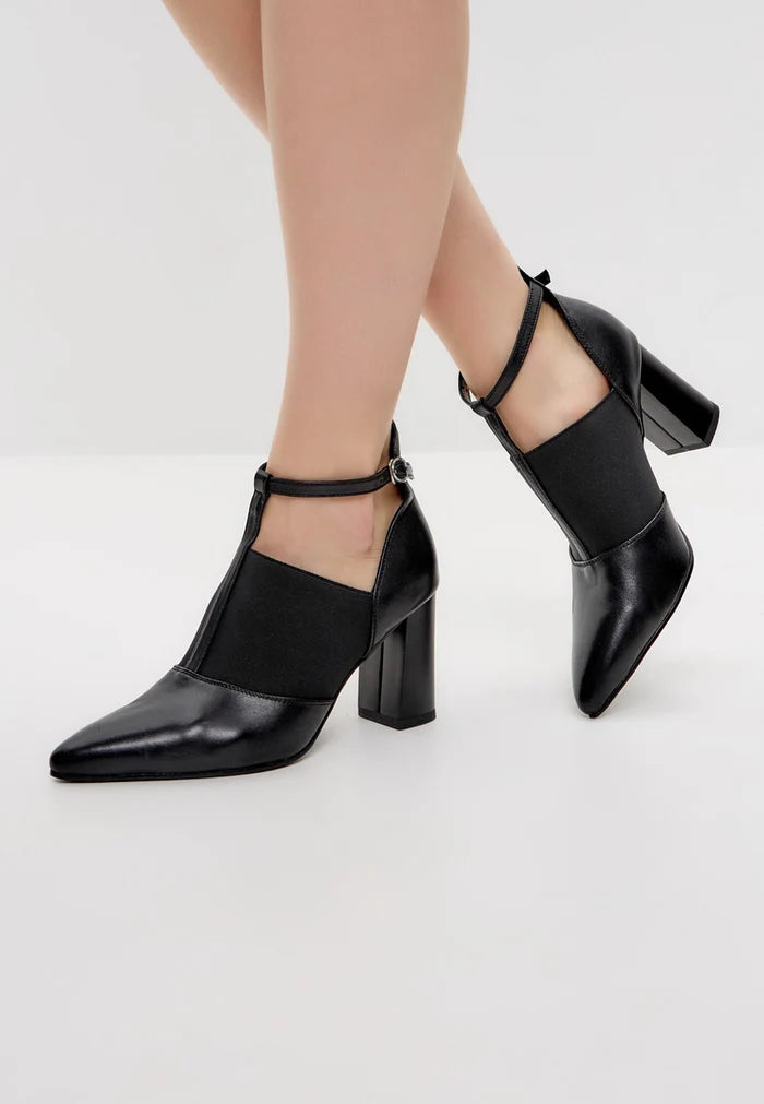 A stylish and trendy collection of women's block heel shoes, T-strap heels, elevated sandals, chunky heel footwear, and fashionable high heels.