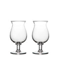Two clear glass tulip-shaped stemmed glasses with rounded bowls and pedestal bases.