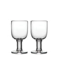 Two clear glass water glasses with pedestal bases and cylindrical bowls.