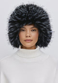 Woman wearing a stylish blue faux fur hat, perfect for winter fashion and warmth.