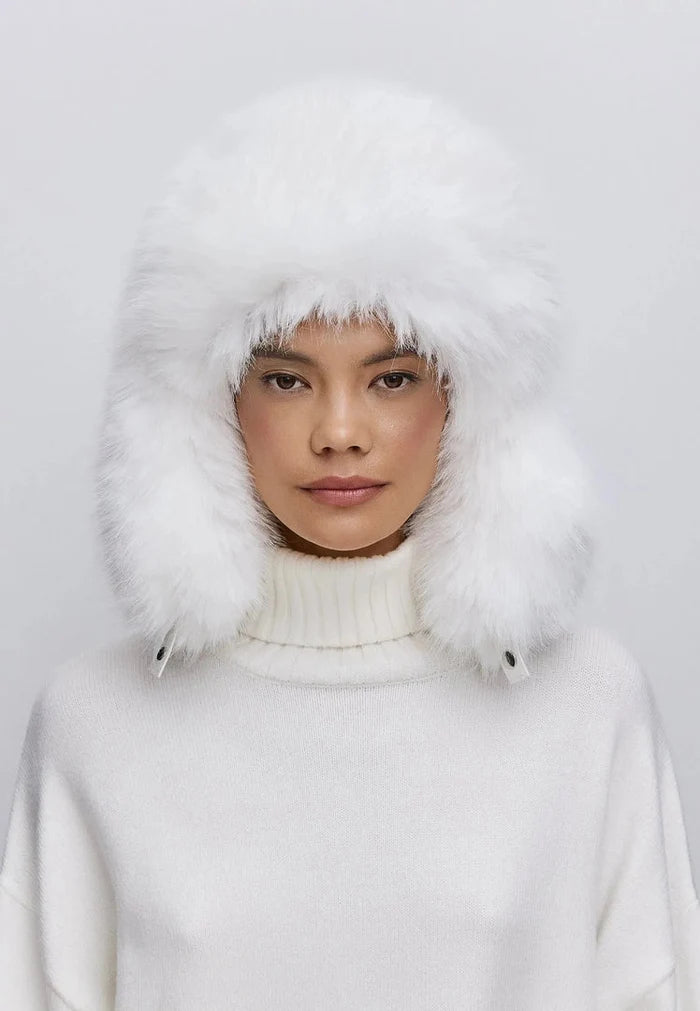 Stay cozy and stylish this winter with a white faux fur hat - buy your perfect faux fur hat now!