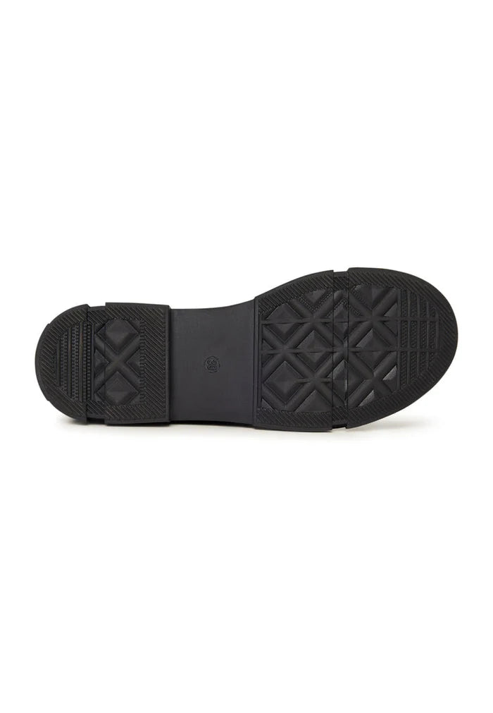 A stylish pair of black leather women's flat sole ankle boots with a trendy design, perfect for everyday wear.