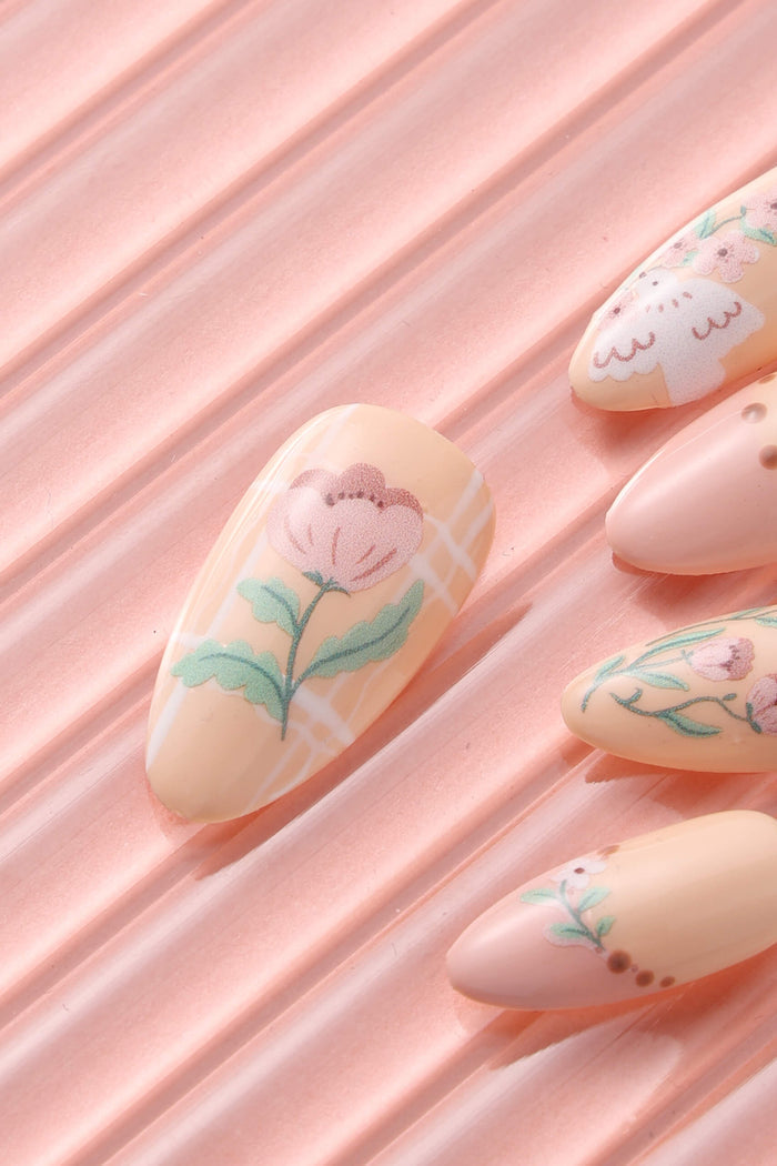Garden Melody press-on nails with floral and plaid designs