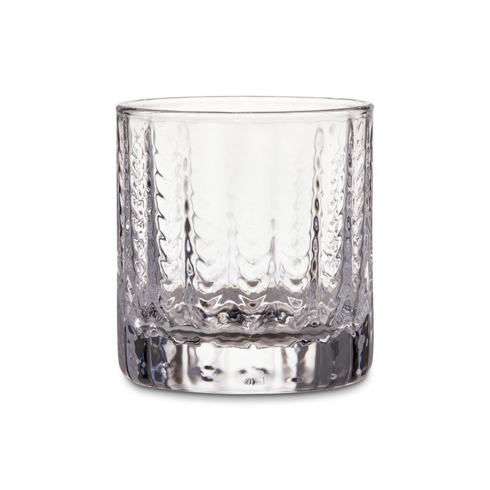 Clear glass lowball with textured vertical ridges and weighted base.
