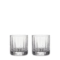 Two clear lowball glasses with textured diamond pattern design and thick bases, displayed side by side.