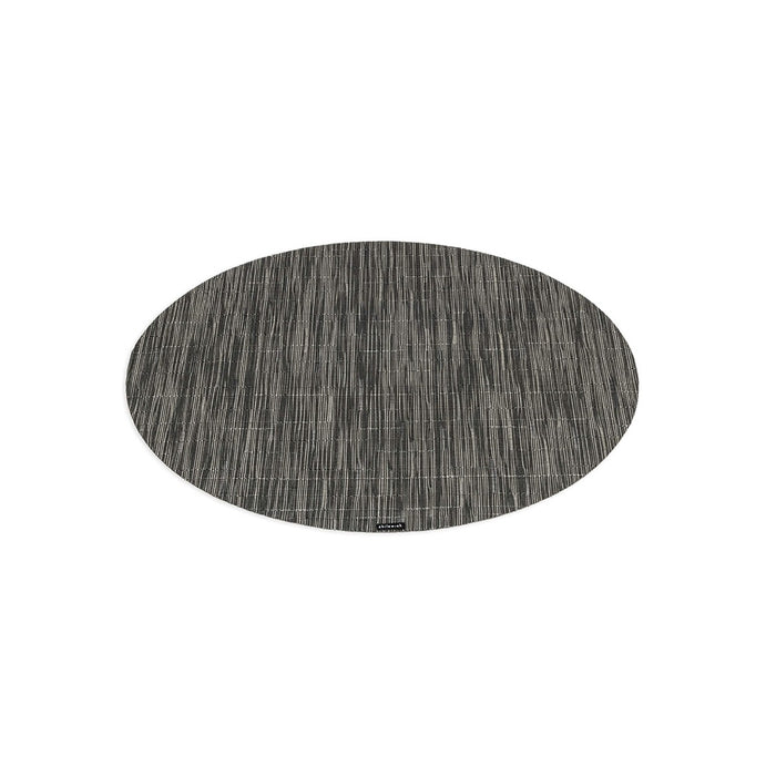 Grey oval placemat with bamboo texture and vertical line pattern.