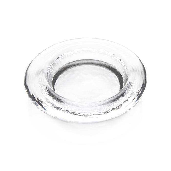 Clear glass round coaster with textured rim and shallow center well.