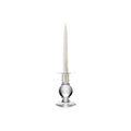 Clear glass candlestick with spherical base holding a tall cream taper candle.