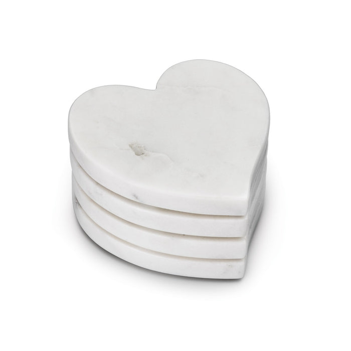 Four white marble heart-shaped coasters stacked together with visible veining throughout.