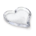 Clear glass tray shaped like a heart with a shallow well and raised edges.
