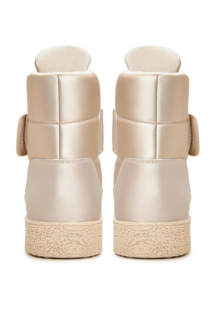 Stay warm and stylish this winter with beige high-top boots featuring velcro straps - the perfect choice for your winter footwear needs.