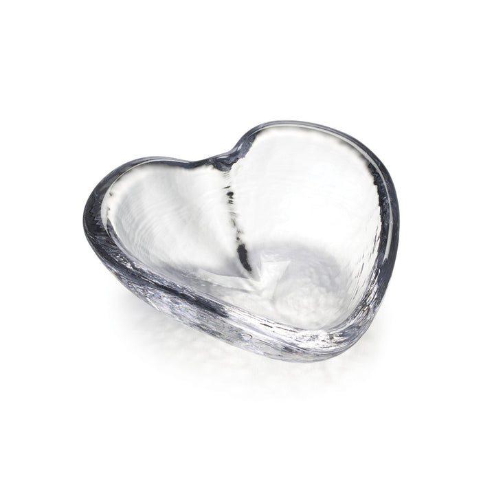 Clear glass dish molded into a heart shape with a dark gray rim and textured interior surface.