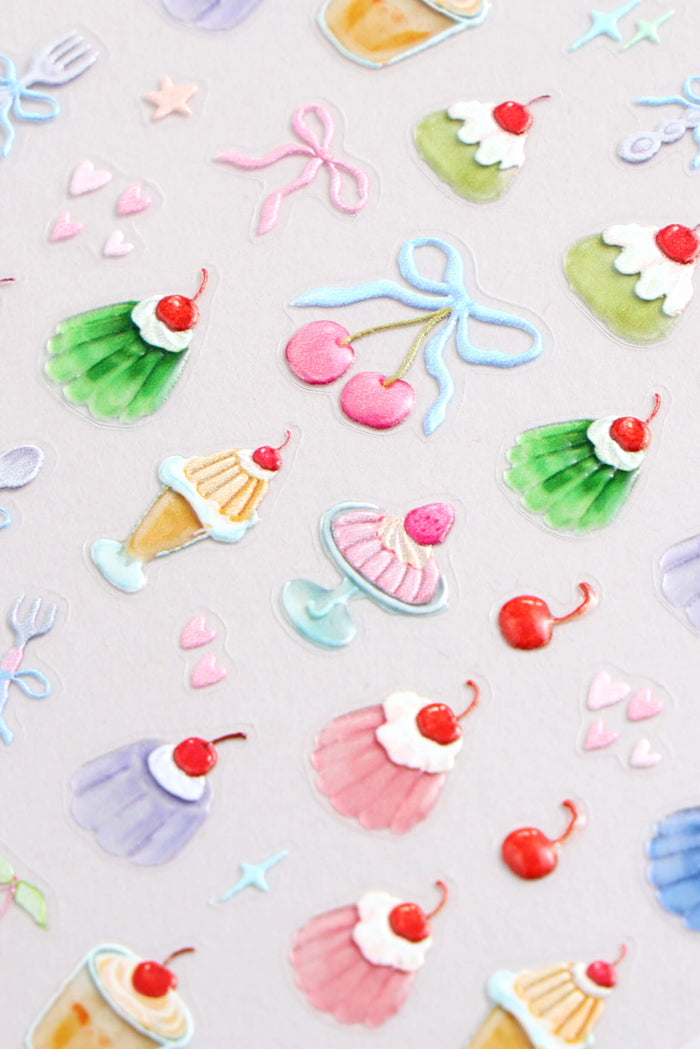 Sheet of Jello Party nail stickers featuring pastel desserts like cupcakes, ice cream cones, cherries, and bows.