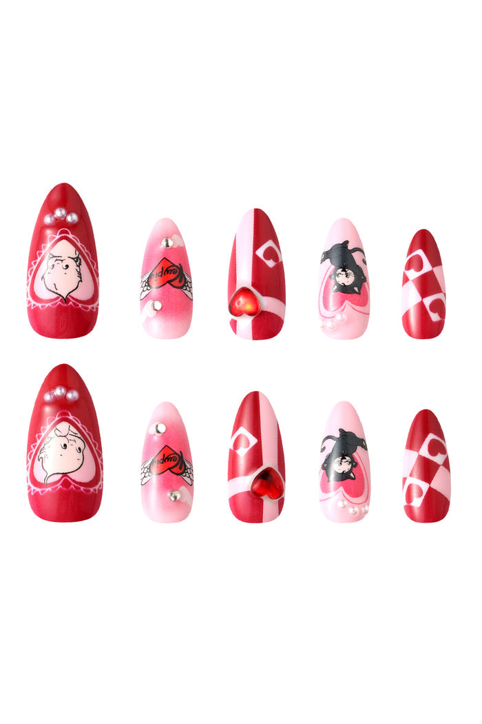Kewpie cat press-on nails: Valentine's designs with Kewpie, black cat, and hearts. Pink and red.