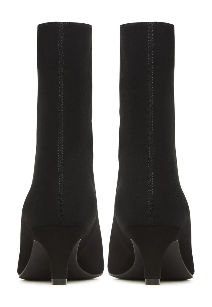 A stylish pair of black kitten heel ankle boots, perfect for any fashion-forward woman looking to add a touch of elegance to their outfit.
