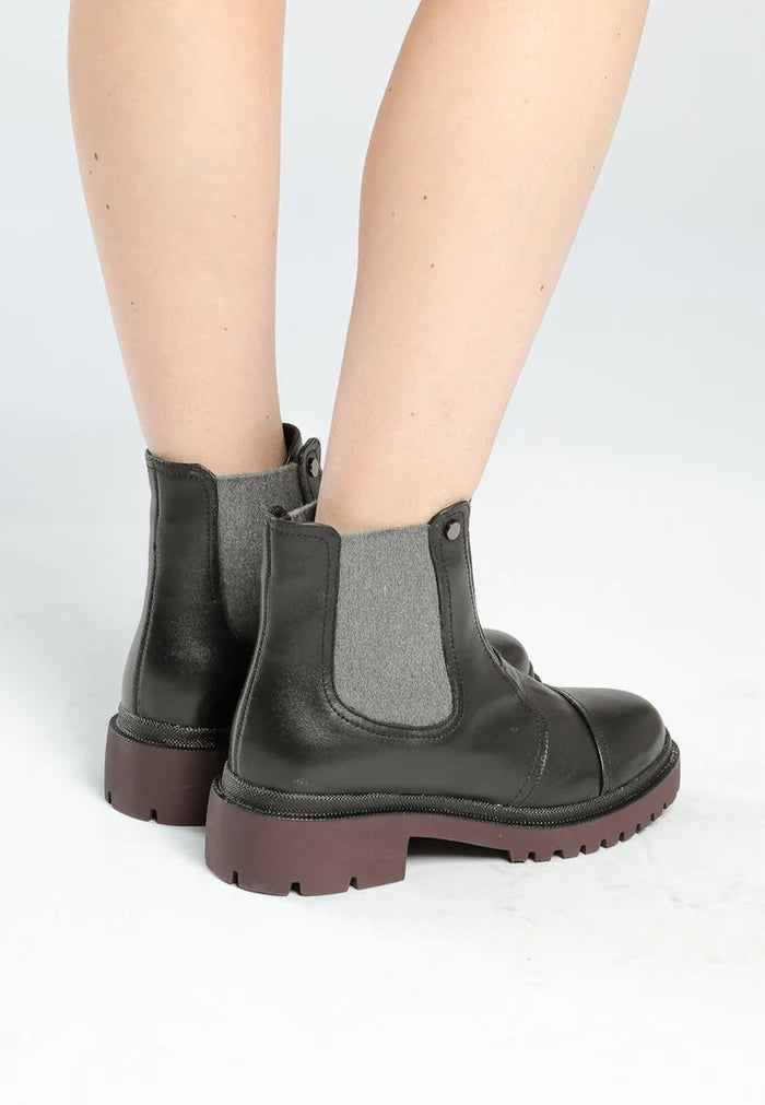 A pair of stylish ankle boots made from high-quality leather, perfect for any fashion-forward outfit.