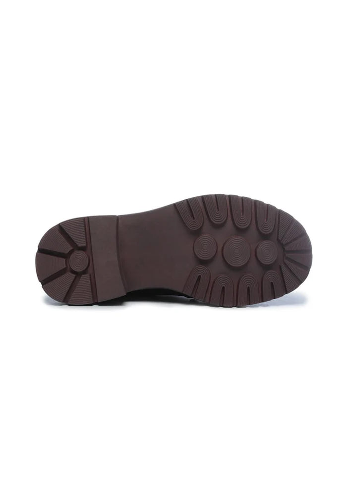 A stylish pair of designer leather ankle boots, made from high-quality leather, perfect for fashionable footwear lovers.
